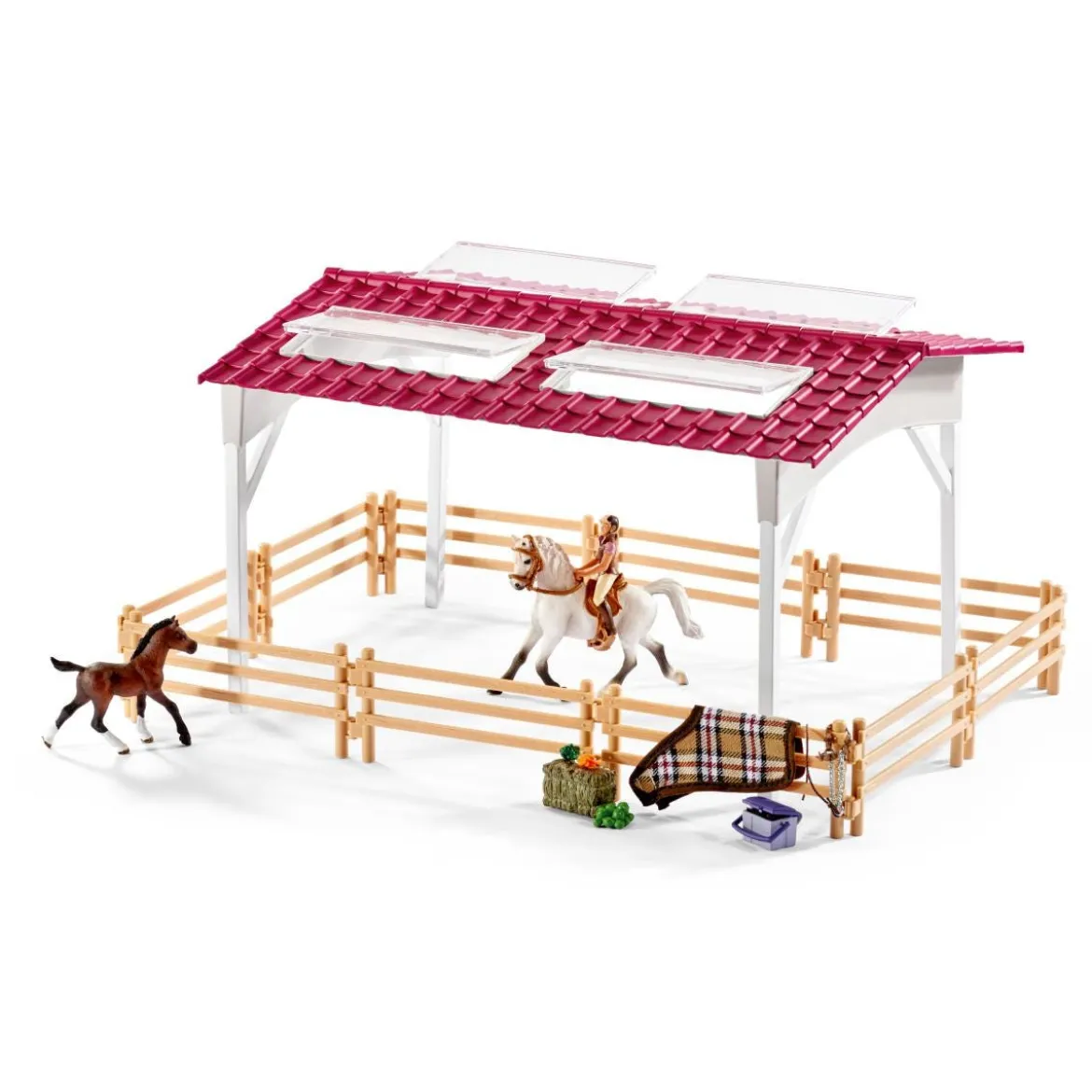 Centre équestre avec cavalière, chevaux et accessoires
