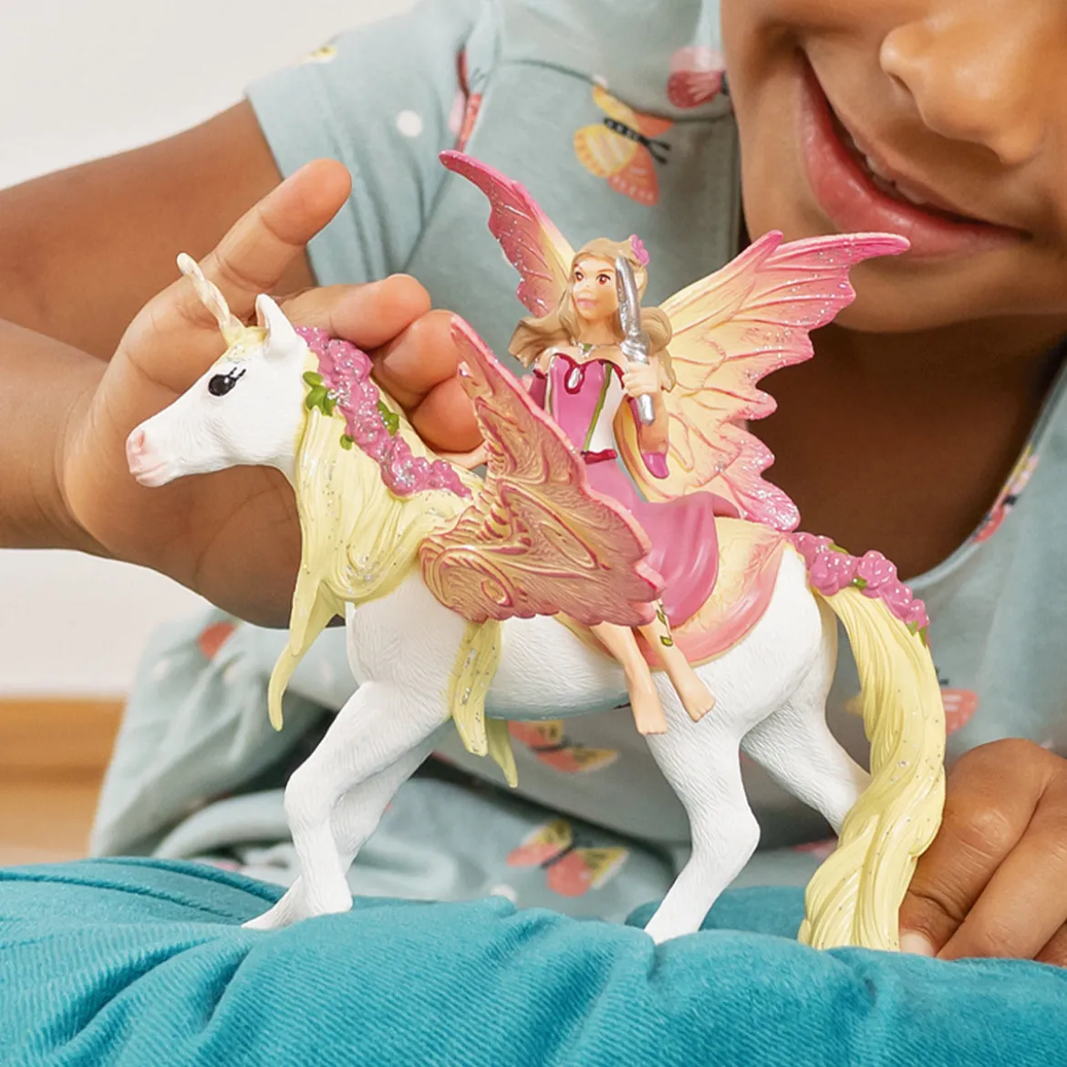Feya et une licorne ailée
