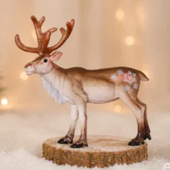 Renne de Noël en or rose
