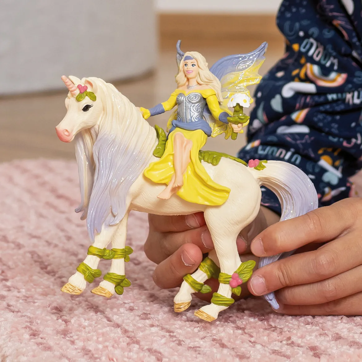 Sera avec la licorne aux fleurs